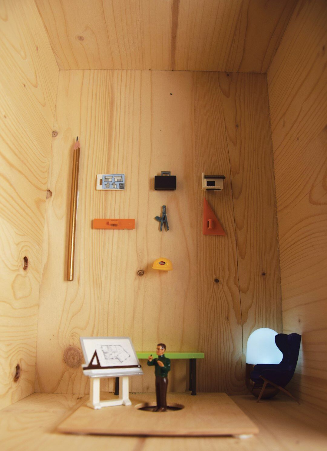 Photo by Keva Epale A small room with a desk and a chair